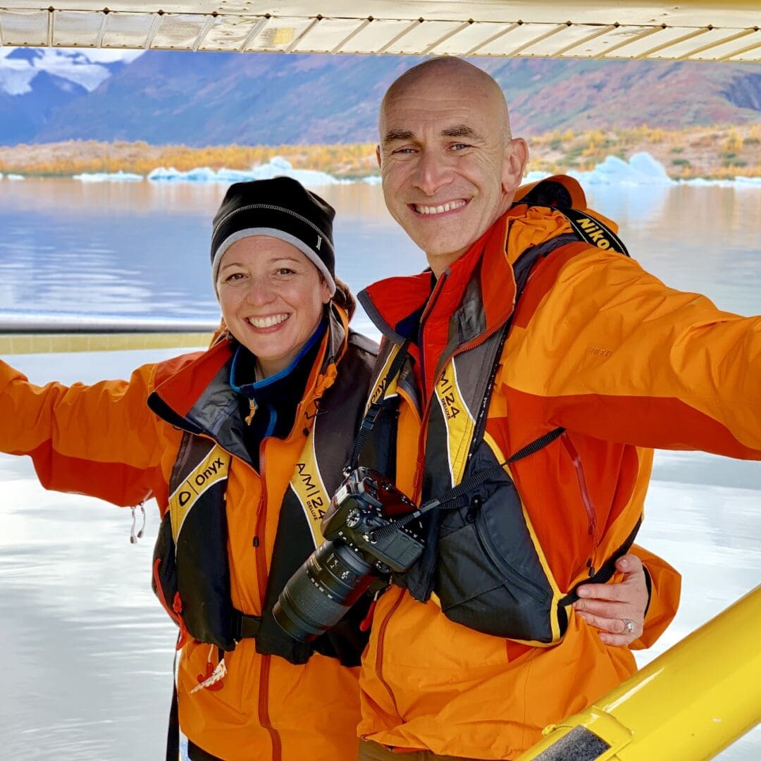 Untitled (8) Two people smiling on a boat trip.